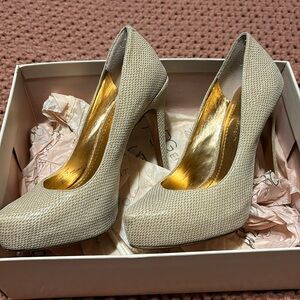 BCBGeneration snake leather pumps size 6